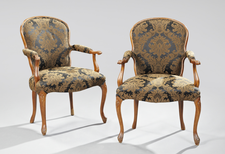 Appraisal: Pair of Provincial Louis XV-Style Fruitwood Fauteuils second quarter th