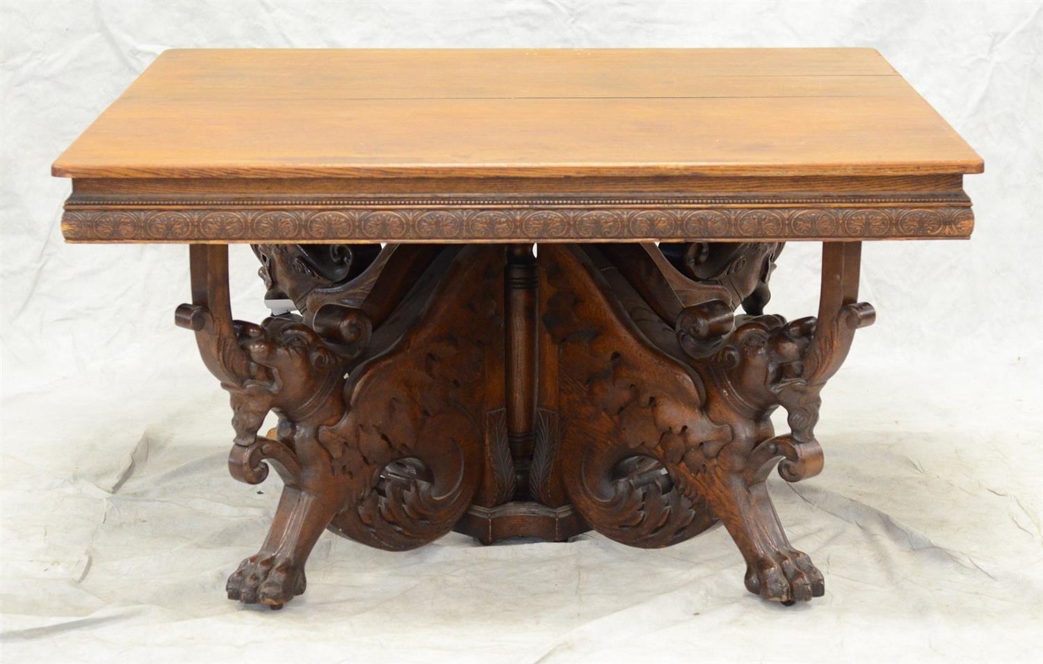 Appraisal: Split pedestal square oak DR table with winged seated lion