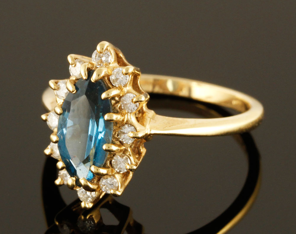 Appraisal: A - K Gold Diamond and Topaz Ring K yellow