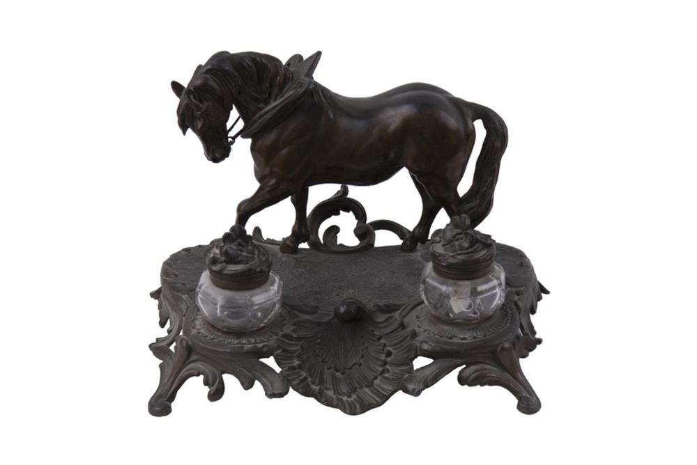 Appraisal: SPELTER FIGURAL DOUBLE INK STANDwith a central plow horse inches