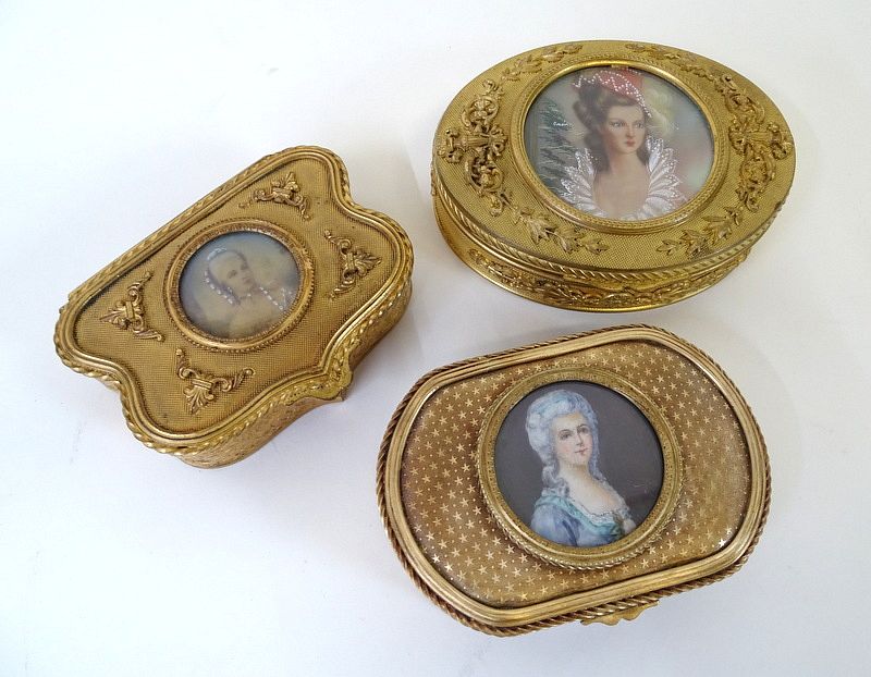 Appraisal: Three French Gilt Bronze Portrait Vanity Boxes Three French Gilt