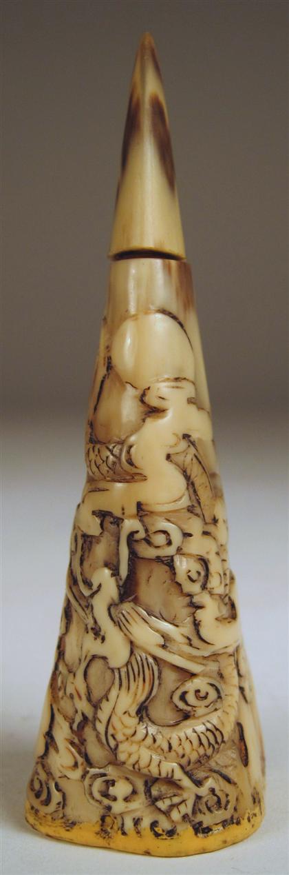 Appraisal: Unusual Chinese hornbill snuff bottle The conical beak-tip bottle carved