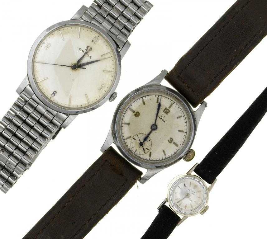 Appraisal: TWO OMEGA STAINLESS STEEL WRISTWATCHES AND A GIRARD PERREGAUX CT