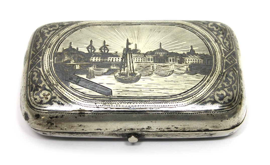 Appraisal: A Russian niello decorated curved rectangular cigar case the cover