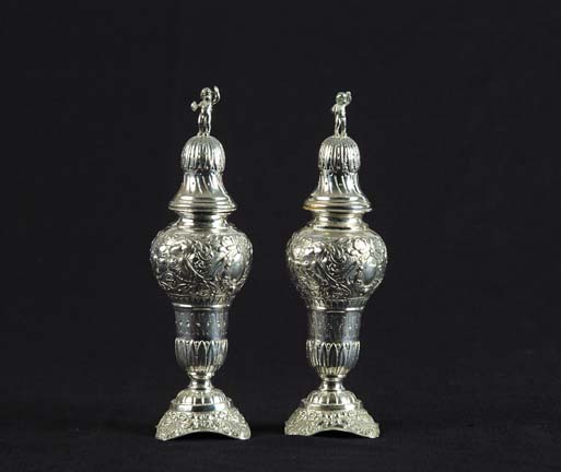 Appraisal: PAIR OF GERMAN SILVER SUGAR CASTORS Baluster form with domed