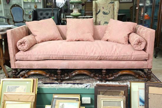 Appraisal: SOFA Pink upholstery with a carved and turned base ''