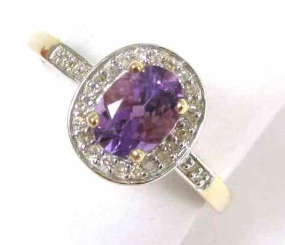 Appraisal: AMETHYST DIAMOND AND FOURTEEN KARAT GOLD RING round-cut diamonds surround