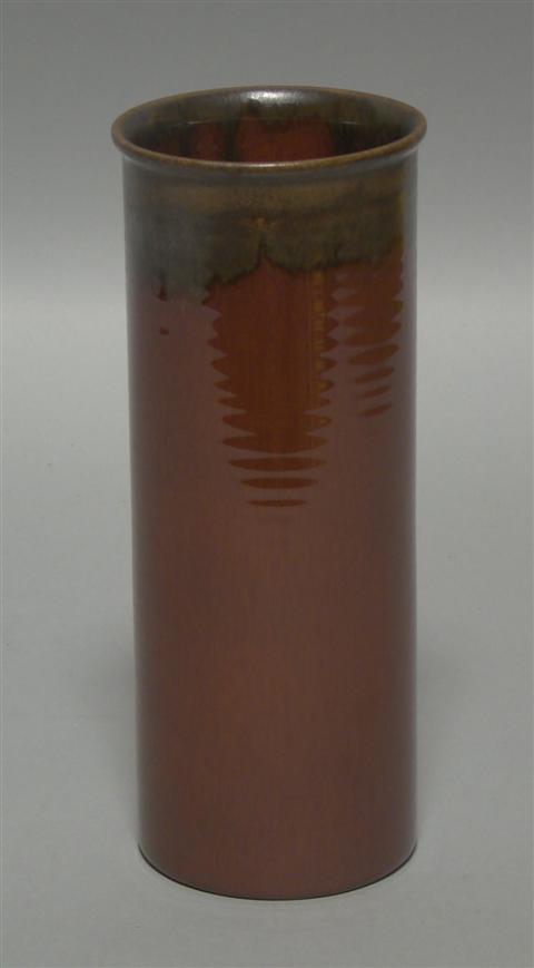 Appraisal: ROOKWOOD RED GLAZED CYLINDRICAL VASE Impressed date covered in standard