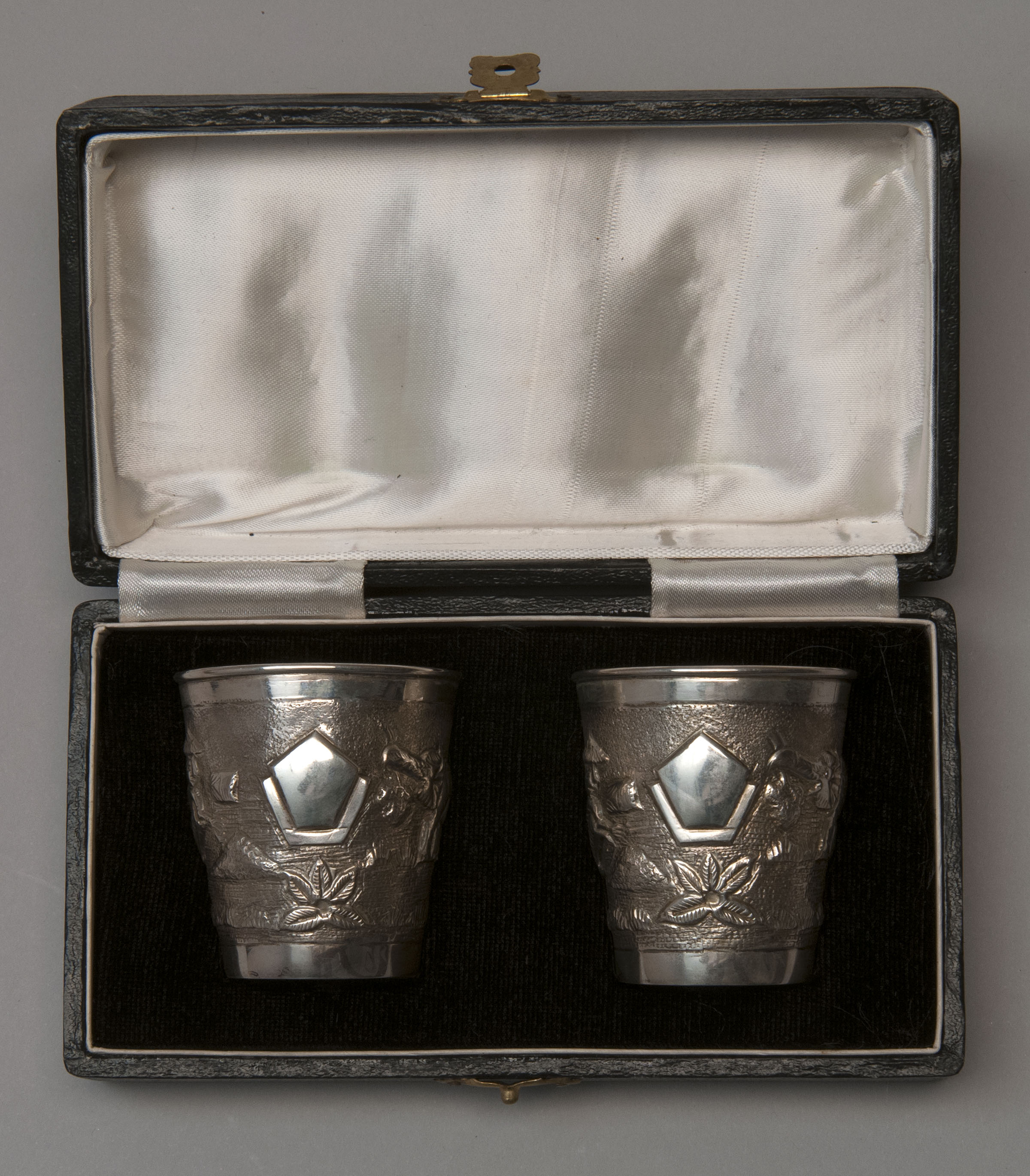 Appraisal: PAIR OF STERLING SILVER SHOT GLASSES Asia Second Half of