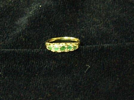 Appraisal: An emerald five-stone ring in a ct gold mount engraved