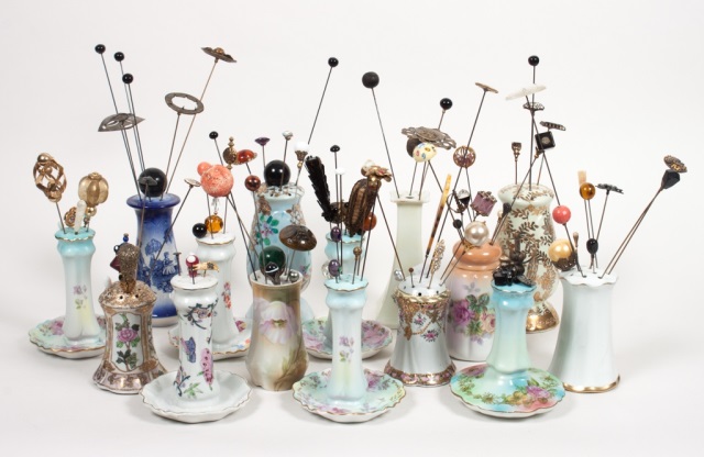 Appraisal: Collection of lady's hatpins and porcelain holders comprising about pins