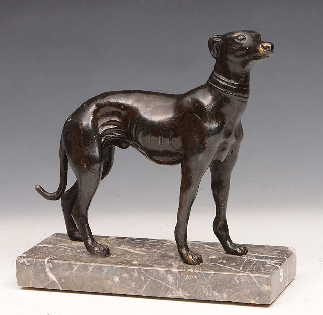 Appraisal: A BRONZE MODEL of greyhound on a rectangular variegated marble