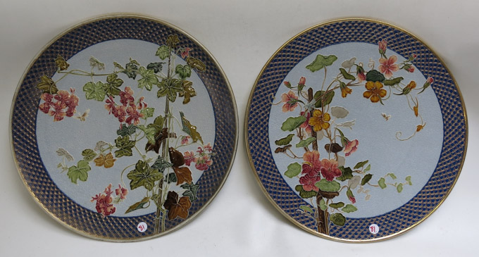 Appraisal: TWO METTLACH ETCHED AND GLAZED POTTERY PLAQUES and each of