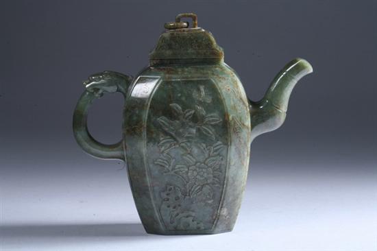 Appraisal: CHINESE DARK GREEN JADE TEAPOT The front and rear have