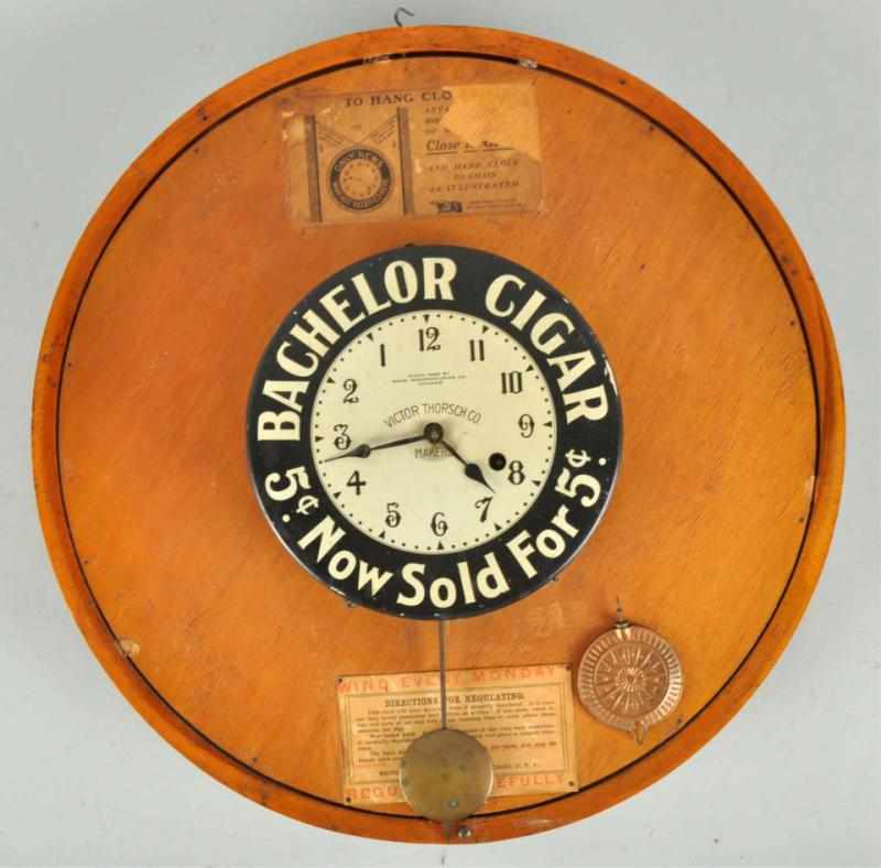 Appraisal: Bachelor Cigar -Sided Advertising Clock Description Very unique clock made