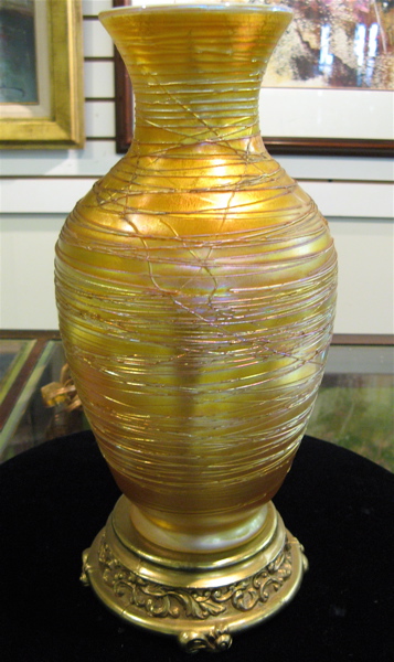 Appraisal: DURAND ART GLASS LAMP BASE The gold iridescent body having