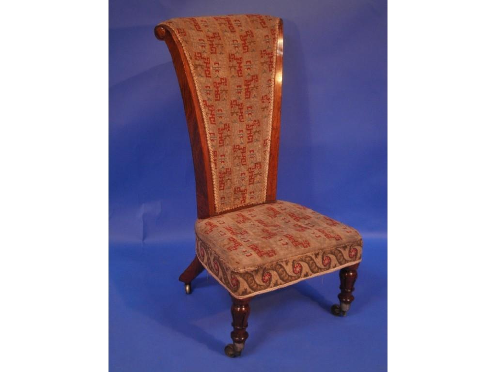 Appraisal: A Victorian oak Prie Dieu with woolwork upholstery on turned