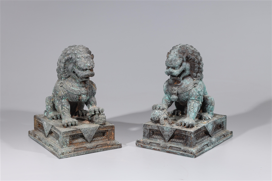 Appraisal: Pair of Chinese bronze foo lions some wear some rusting