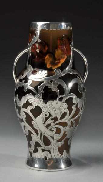 Appraisal: Small Rookwood Pottery Vase with Silver Overlay Description Vase marked