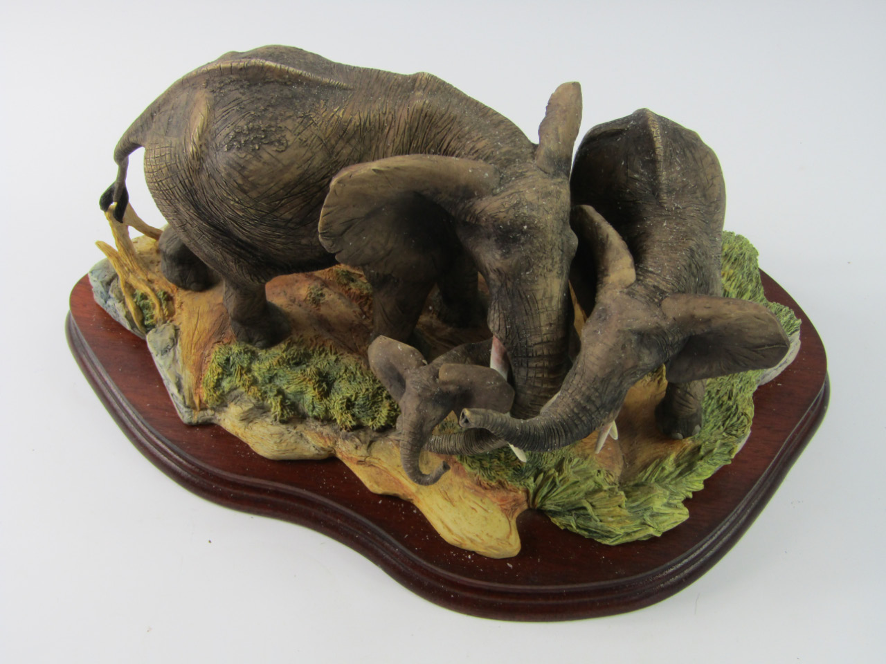 Appraisal: A Border Fine Arts figure group of elephants on a