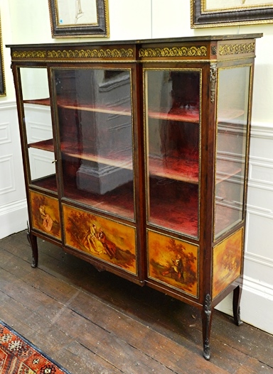 Appraisal: A French mahogany gilt metal mounted Vernis Martin breakfront vitrine