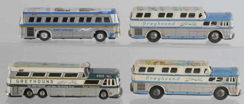 Appraisal: Lot of Tin Greyhound Bus Friction Toys Description Japanese Working