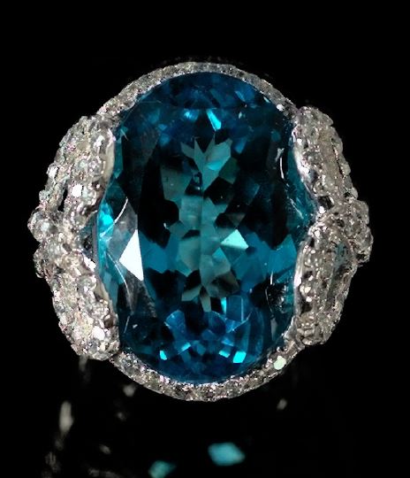 Appraisal: Lady's Fourteen-Karat White Gold Blue Topaz and Diamond Cocktail Ring