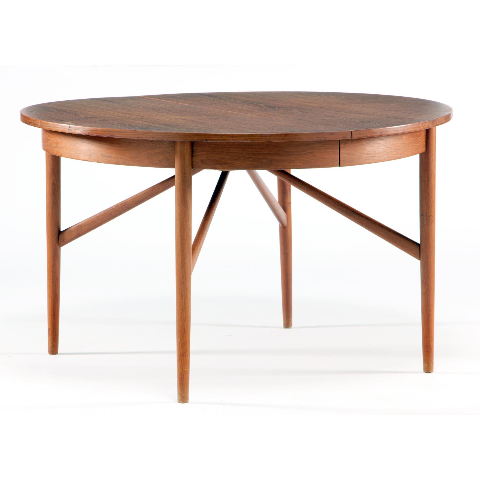 Appraisal: Illums Bolighus Dining Table s teak two leaves stretcher base