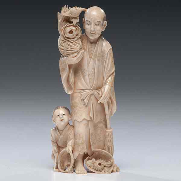 Appraisal: Fine Japanese Carved Ivory Okimono Japanese a farmer figure and