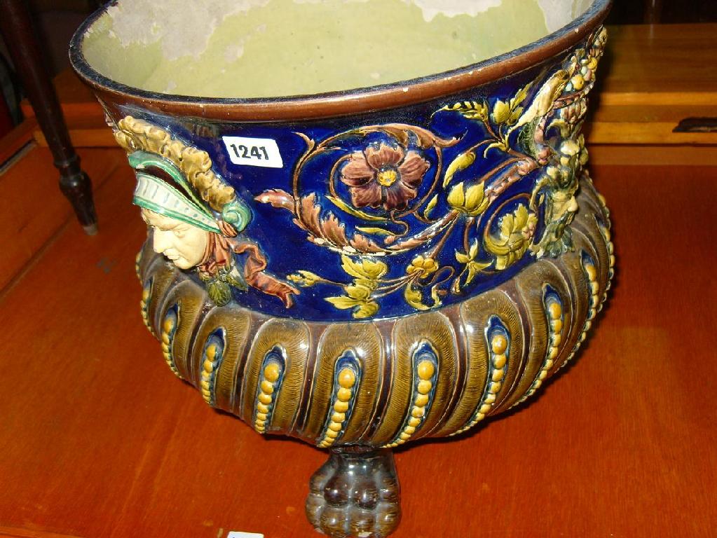 Appraisal: A Victorian ceramic jardiniere of baluster form with applied mask