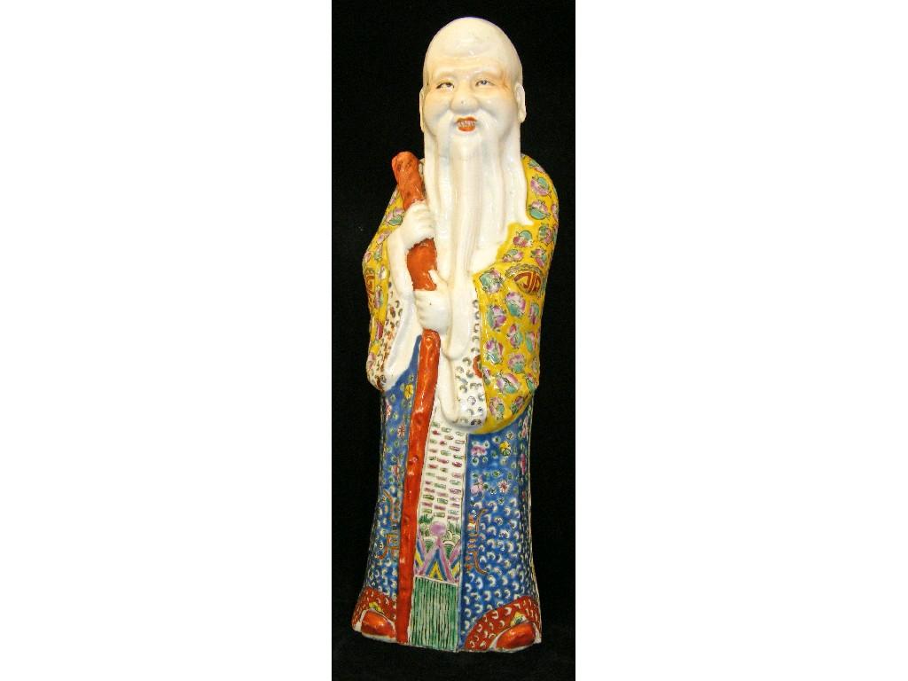 Appraisal: Chinese porcelain figure of Shoulao modelled holding a rustic staff