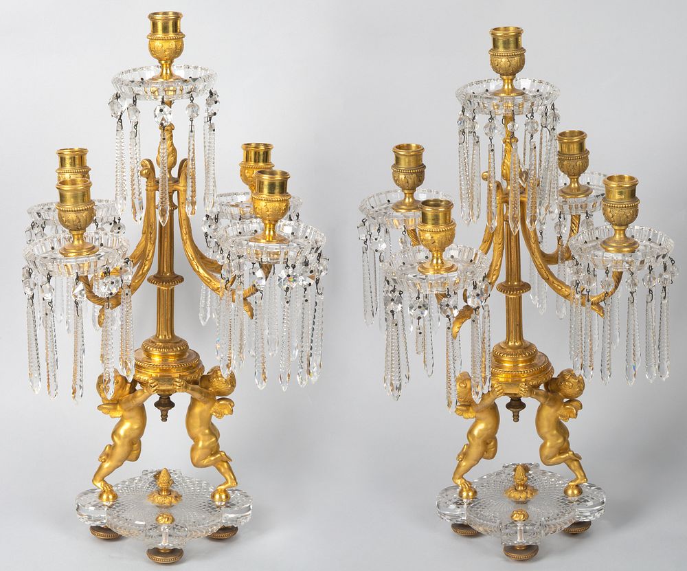 Appraisal: A PAIR OF ORMOLU AND CUT CRYSTAL TABLE CANDELABRA BACCARAT