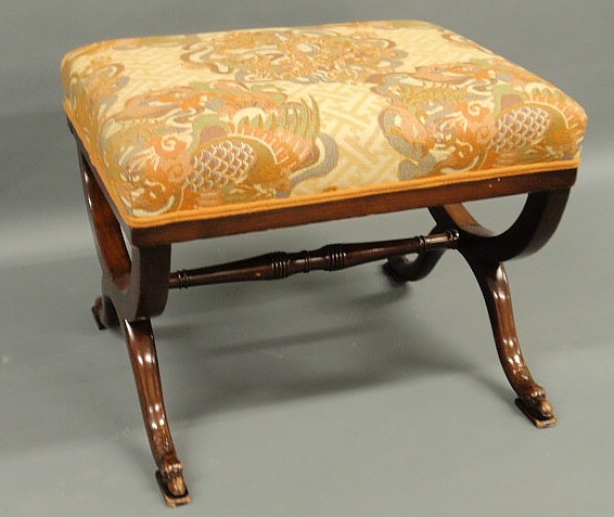 Appraisal: Mahogany footstool with carved feet and stretcher base h x