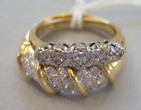 Appraisal: An ct gold and diamond set ring in a triple