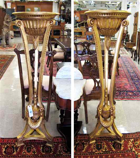 Appraisal: A PAIR OF LOUIS XVI STYLE GILTWOOD TORCHIERE PLANTSTANDS each