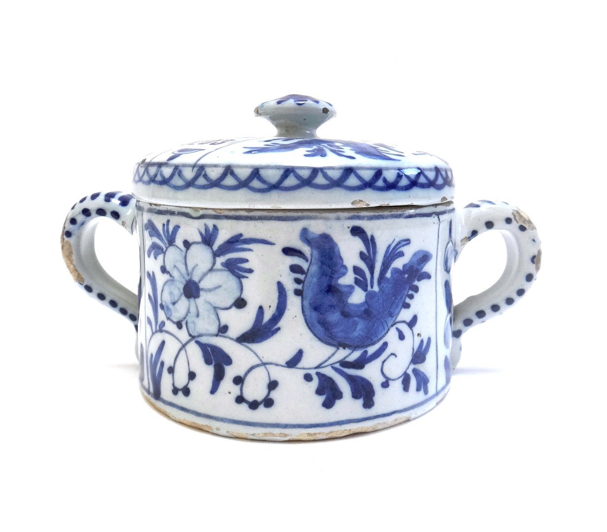 Appraisal: A Dutch Delft blue and white two-handled posset pot and