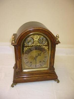 Appraisal: A MANTEL CLOCK by Winterholder Hofmeier the eight day chiming