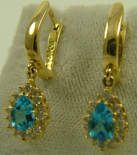 Appraisal: PAIR OF BLUE TOPAZ AND DIAMOND EARRINGS each K yellow