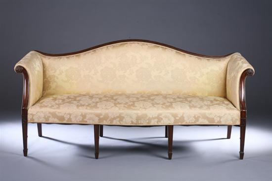 Appraisal: GEORGE III STYLE MAHOGANY CAMELBACK SOFA early th century with