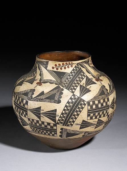 Appraisal: An Acoma polychrome jar With an allover pattern of geometric