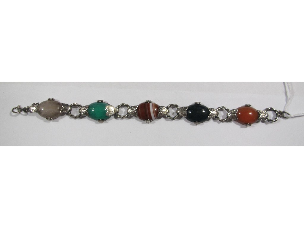 Appraisal: Scottish vari coloured agate bracelet with oval sections in foliate