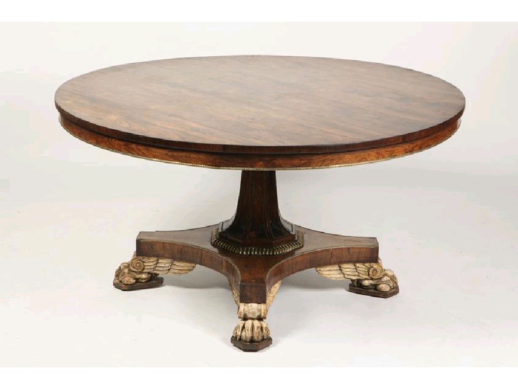 Appraisal: A FINE REGENCY ROSEWOOD AND PARCEL-GILT CENTRE TABLE in the