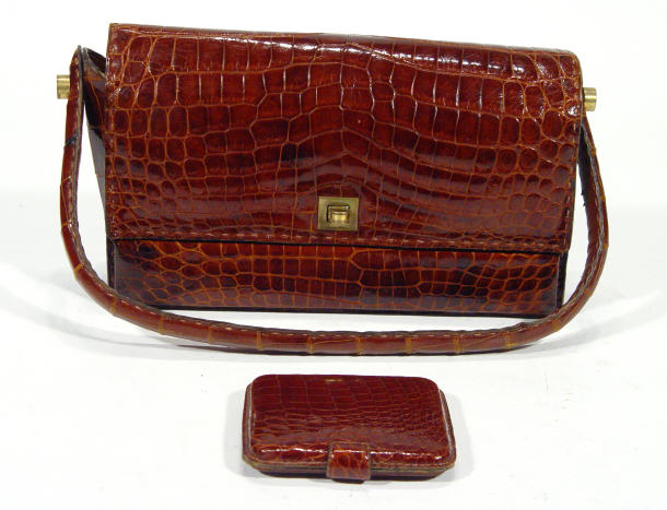 Appraisal: Crocodile skin ladies handbag and a matching compact with mirrored