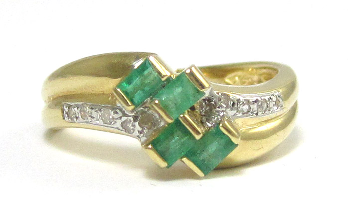 Appraisal: EMERALD DIAMOND AND FOURTEEN KARAT GOLD RING set with four