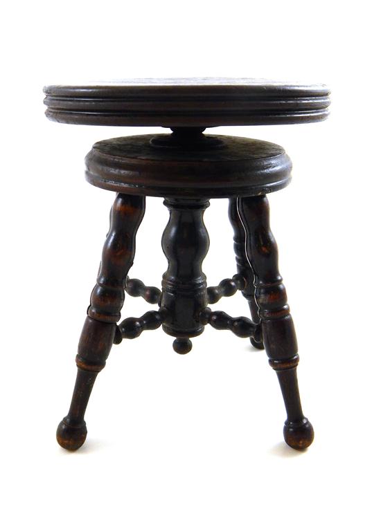 Appraisal: Late th early th C diminutive adjustable piano stool dark