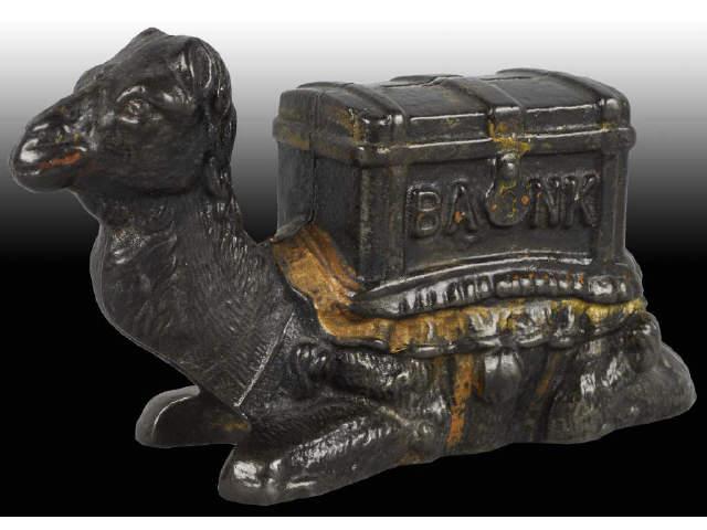 Appraisal: Cast Iron Kneeling Camel Still Bank Description Made by Kyser