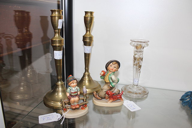 Appraisal: TWO HUMMEL FIGURES a glass candlestick and a pair of