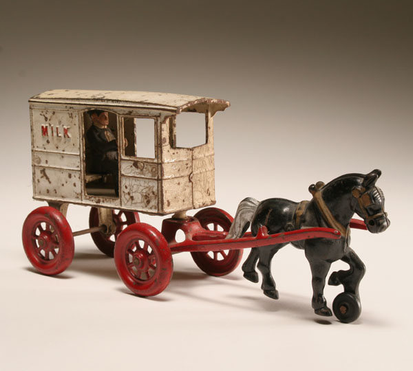 Appraisal: Kenton cast iron milk delivery wagon with driver L Paint