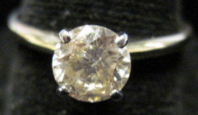 Appraisal: Lady's karat yellow gold diamond engagement ring Approximately carat round