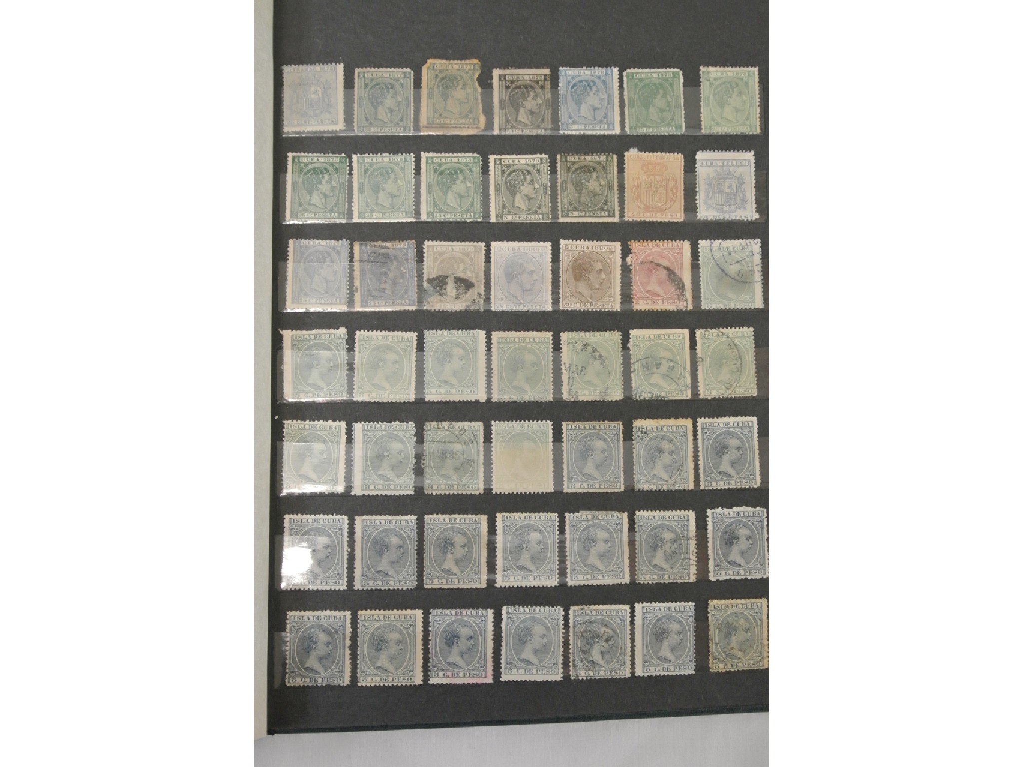 Appraisal: A stock book containing a quantity of early stamps from